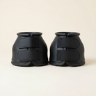 Pair of black rubber horse bell boots