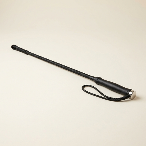 Black dressage whip with braided shaft and leather grip