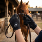 Summer mesh riding gloves worn by rider holding reins