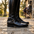 English riding spurs worn on rider boots