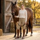 Women's riding leggings worn by rider at stable yard