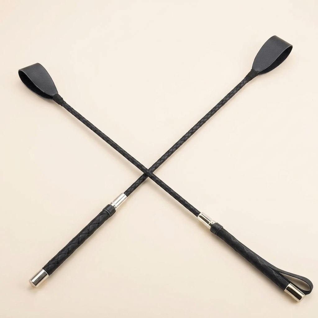 Riding crop black studio product shot