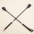 Riding crop black studio product shot