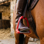 Aluminium safety stirrup on a saddle close-up